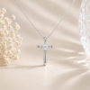 Infinity Solitaire Moissanite Cross Necklace in Sterling Silver